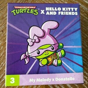 McDonald's Hello Kitty X Teenage Mutant Ninja Turtles Toy - Purple and Green